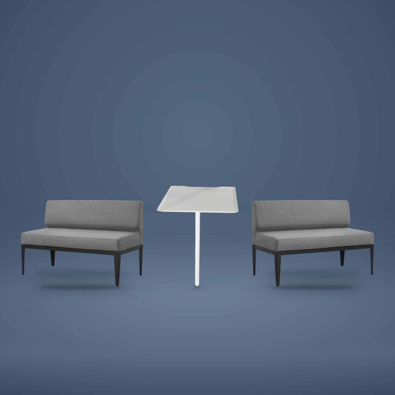 The furniture included with an L4-Pod — two grey upholstered two-seat bench sofas on black tapered legs facing each other across a white bar table on a slim white column, shown against a slate blue-grey background